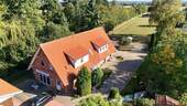 Titelbild - Ensemble aus Mehrfamilienhaus, großem Baugrundstück und kleiner Weide - im Herzen von Pattensen