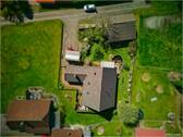 Drohnenansicht - 9 Zimmer Mehrfamilienhaus, Wohnhaus zum Kaufen in Westerstede