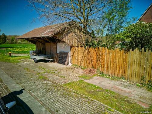 Drohnenansicht - Mehrfamilienhaus, Wohnhaus mit 186,00 m&sup2; in Westerstede zum Kaufen