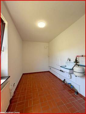 Hauswirtschaftsraum mit Heizungsanlage - 