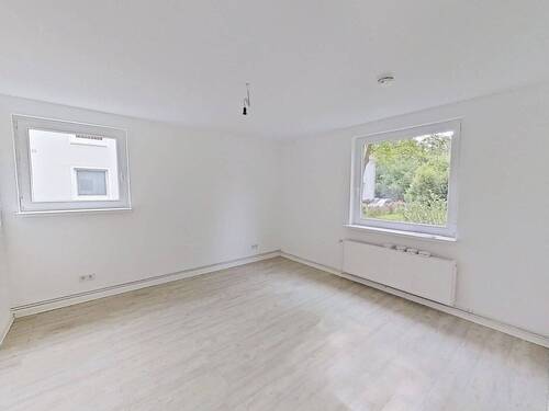 Ansicht I: Wohn- und Esszimmer - Gemütliche 2-Zimmer-Erdgeschosswohnung mit Gartenzugang