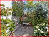 Süd-West-Terrasse am Vorgarten - 