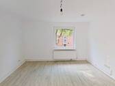 Ansicht I: Wohn- und Esszimmer - Gemütliche 2-Zimmer-Wohnung mit Tageslichtbad in ruhiger Lage