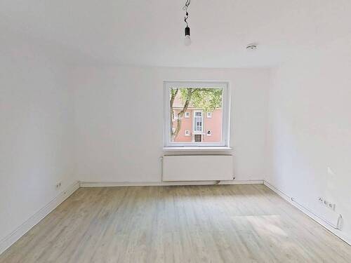 Ansicht I: Wohn- und Esszimmer - Gemütliche 2-Zimmer-Wohnung mit Tageslichtbad in ruhiger Lage