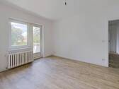 Ansicht I: Wohnzimmer - ERSTBEZUG NACH SANIERUNG: Gemütliche 2-Zimmer-Wohnung mit Balkon!