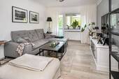 Wohnzimmer - Zeitlos wohnen - sehr gepflegte 4-Zimmer-Wohnung mit modernem Komfort