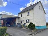 Rückansicht mit Carport - 7 Zimmer Einfamilienhaus zum Kaufen in Bellingen