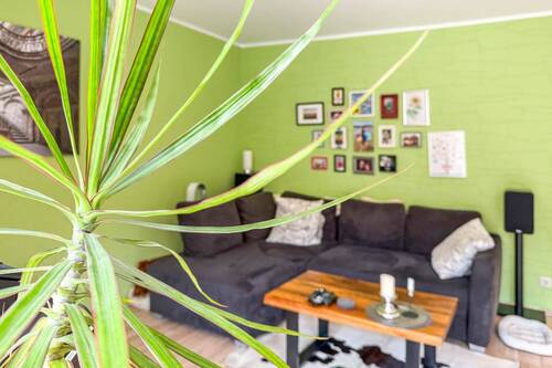 Impression Wohnzimmer - Etagenwohnung mit 99,10 m&sup2; in Rösrath zum Kaufen