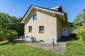 Seitenansicht - Die Natur vor der Tür - Freistehendes Einfamilienhaus in Waldrandlage