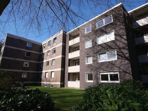 Außenansicht - Seltenheit: Gepflegte 4,5-Zimmer-EG-Wohnung mit Balkon, Gemeinschaftsgarten und Stellplatz in Buer