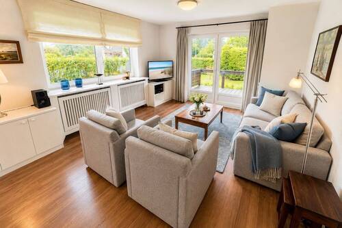 Wohnzimmer mit Terrassenzugang - 6 Zimmer Einfamilienhaus in Wyk auf Föhr