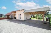 Carport mit Werkstatt - Doppelhaushälfte mit 114,30 m&sup2; in Tribsees zum Kaufen