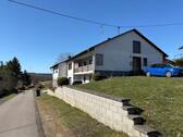 Vorder-und Seitenansicht - 6 Zimmer Einfamilienhaus zum Kaufen in Schönberg