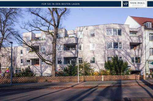Titel - Leben in bester Lage: Moderne Wohnung mit großem Balkon und Garagenplatz!