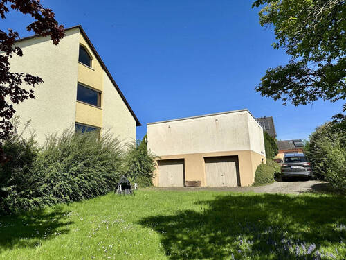 Rückansicht Garagengebäude - Einfamilienhaus mit 260,00 m² in Wittlich-Neuerburg zum Kaufen