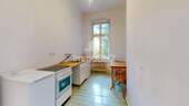 Küche mit Dielen - 1 Zimmer Etagenwohnung in Berlin
