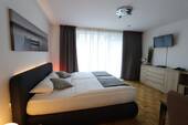 Schlafraum - Modern Möbliertes Apartment direkt am Rhein mit Terrasse