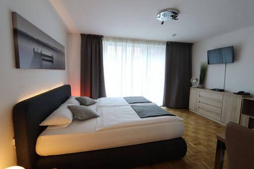 Schlafraum - Modern Möbliertes Apartment direkt am Rhein mit Terrasse