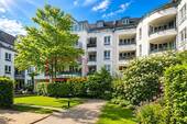 00_Aussenansicht (KI) - Zentral & Ruhig - Ideale 2-Zimmer-Stadtwohnung in grüner Innenhoflage!