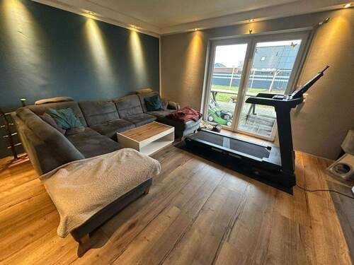 Wohnzimmer - Einfamilienhaus mit 133,00 m&sup2; in Ostrhauderfehn zum Kaufen