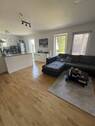 Bild 1 - Moderne Gartenwohnung am Chiemsee - KFW55, Westterrasse, Tiefgarage & perfekte Lage