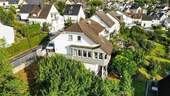 Haus Außenansicht - Einfamilienhaus in Hanglage mit einzigartiger Aussicht