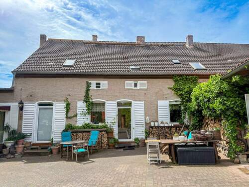 Rückansicht mit Terrasse - 1 Zimmer Einfamilienhaus zum Kaufen in Wiesenburg/Mark