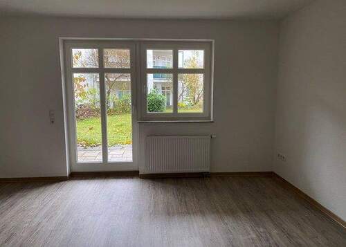 Wohnzimmer - Moderne Singlewohnung mit offener Küche und Terrasse