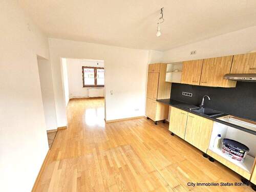 Küche mit Blick zum Wohnzimmer - 