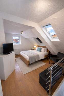 Schlafzimmer 1 im Dachgeschoss - 