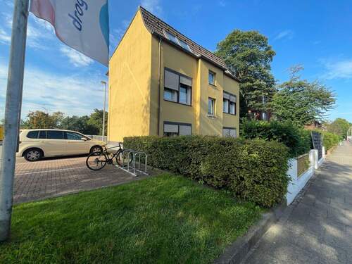 Ansicht1 - Mehrfamilienhaus mit 4 Wohnungen und 5 Garagen