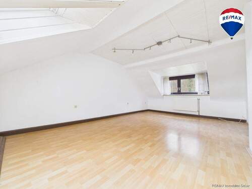 REMAX Immobilien DeLux Mehrfamilienhaus Wohn-/Esszimmer Saarbrücken Mark Borowicz - 