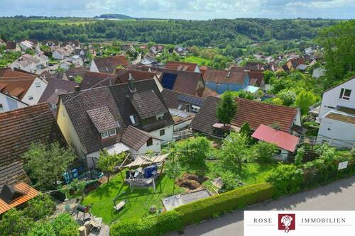 Titelbild - Außergewöhnliches Gebäudeensemble mit viel Nutzfläche, Garagen und Bauplatz in zentraler Lage