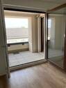 Loggia mit hellen Fliesen - 