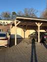 Carport mit Abstellraum und PKW-Stellplatz - 