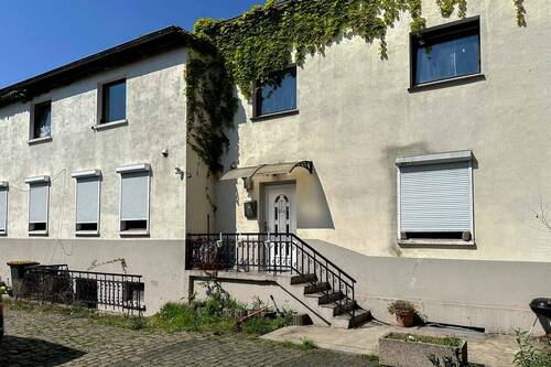Haus2 - Sanierterenovierte Immobilie mit wertigen Details (Granitboden) in zentraler Lage