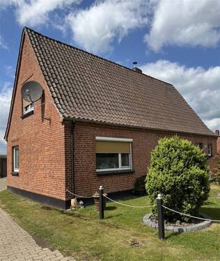 Seitenansicht - Einfamilienhaus mit 132,00 m&sup2; in Twistringen zum Kaufen