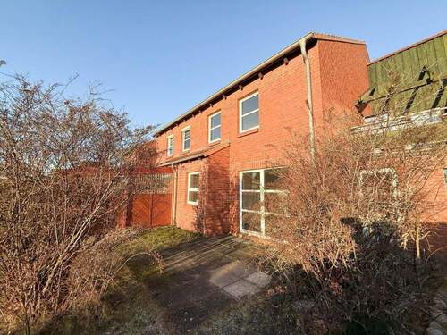 Terrassenansicht - Reihenmittelhaus mit 76,70 m&sup2; in Neumünster zum Kaufen