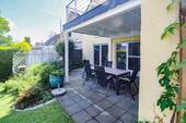 Überdachte Terrasse mit Garagenzugang - 
