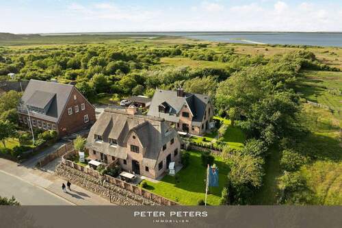 Bild 1 - Haushälfte unter Reet in schöner Lage nahe des Königshafens - Ferienhaus