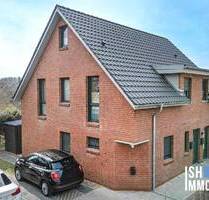 Stade: Junge und moderne Eigentumswohnung im ansprechenden Doppelhaushälften-Charakter