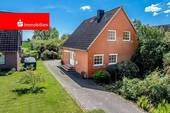Seitenansicht 01 - Einfamilienhaus mit großem Grundstück in ruhiger und grüner Wohnlage von Seester!