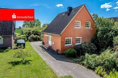 Seitenansicht 01 - Einfamilienhaus mit großem Grundstück in ruhiger und grüner Wohnlage von Seester!