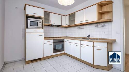 Küche mit Einbauküche - 