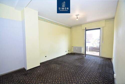 24_Schlafzimmer_mit_Loggiazugang - 