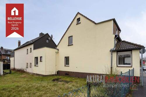 Seitenansicht - 1 Zimmer Mehrfamilienhaus, Wohnhaus zum Kaufen in Monheim am Rhein / Baumberg