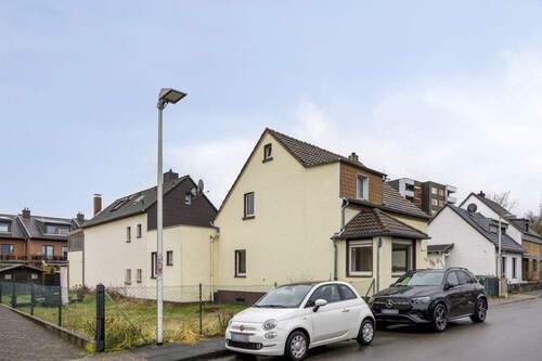 Straßenansicht - 1 Zimmer Mehrfamilienhaus, Wohnhaus in Monheim am Rhein / Baumberg