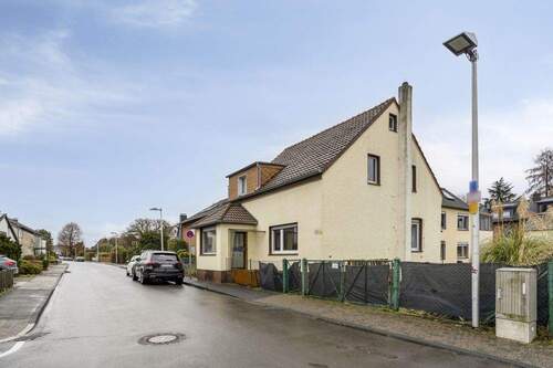 Straßenansicht Haus a. - Mehrfamilienhaus, Wohnhaus mit 230,00 m&sup2; in Monheim am Rhein / Baumberg zum Kaufen