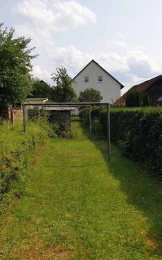 Außenansicht vom Garten - Mehrfamilienhaus, Wohnhaus mit 182,00 m² in Seybothenreuth zum Kaufen