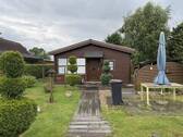 Vorderansicht - schönes Blockbohlenhaus am Stedener See